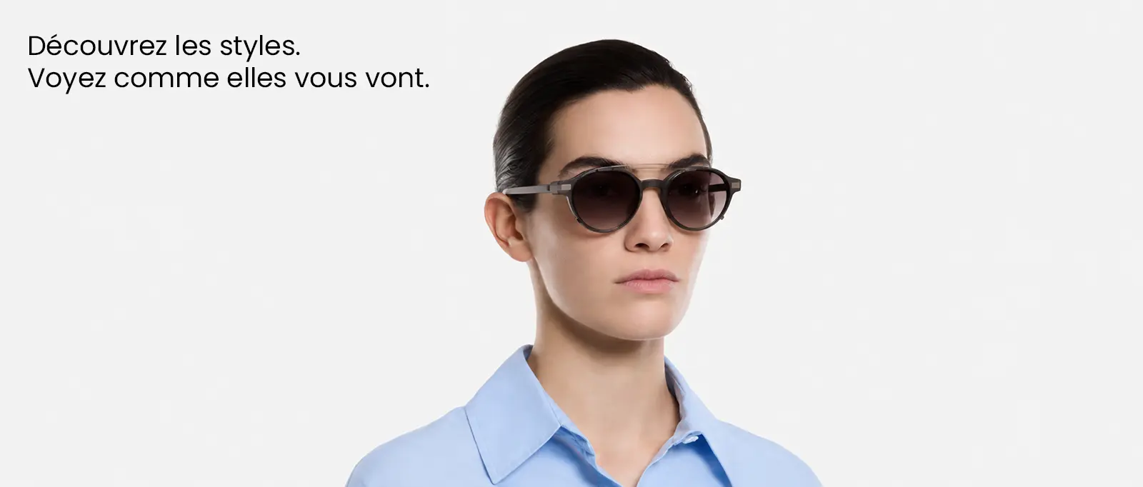 Femme portant les lunettes connectées Even Realities G2 avec monture ronde et verres solaires teintés