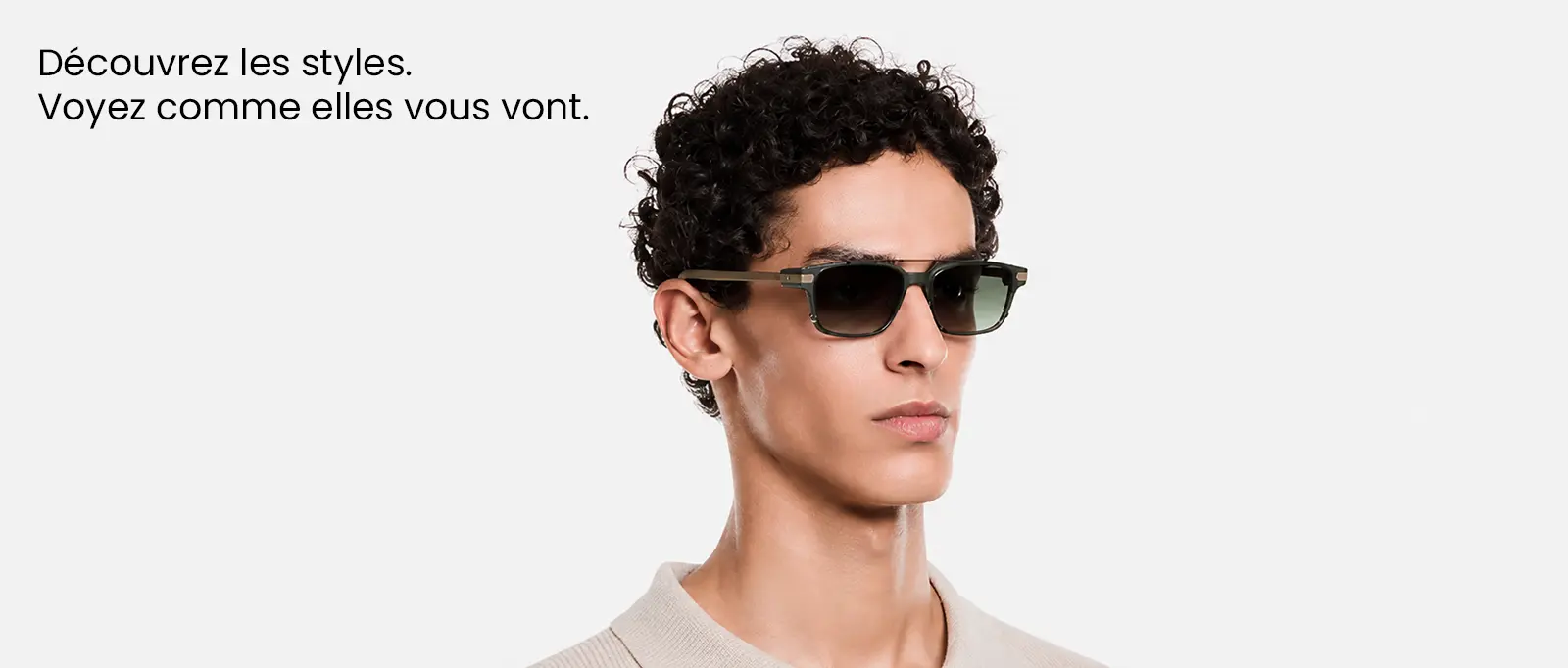 Homme portant les lunettes connectées Even Realities G2 avec monture grise et verres solaires teintés