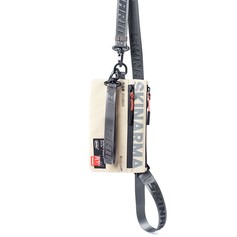 Sac Bandoulière SKINARMA Fardel Clutch Bag en Tissu Déperlant