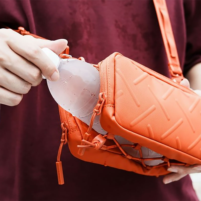 Sac Bandoulière SKINARMA Juno Bottle Sacoche Bag en Nylon Déperlant